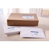 The image shows various shipping packages, including a brown box, a white box, and a white envelope, all with address labels.