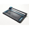 This is a paper cutter with a black-blue finish, including a cutting mat and ruler.
