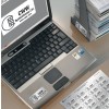 An image showing a laptop with a CWW Systemhouse Ltd. logo on it. There is also a stack of CDs and a sheet of labels in the foreground, indicating branding materials.