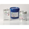 The image displays three containers labeled with hazardous material warnings. The containers include a silver canister labeled 'Heptane,' a blue bucket for 'Polyurethane Coating,' and a silver can with safety warnings. Each container features labels highlighting dangers and safety precautions for handling.