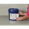 The image shows a blue bucket labeled as 'Polyurethane Coating' from Hark Industries. A hand is placing a caution label on the bucket, which contains safety information and warning symbols. The background is simple and concrete.
