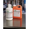 The image shows two chemical containers: one labeled Hydrochloric Acid (6.0N) and the other labeled Sodium Hydroxide (2.8M). Both have warning labels indicating hazards and safety precautions in a lab-like setting.